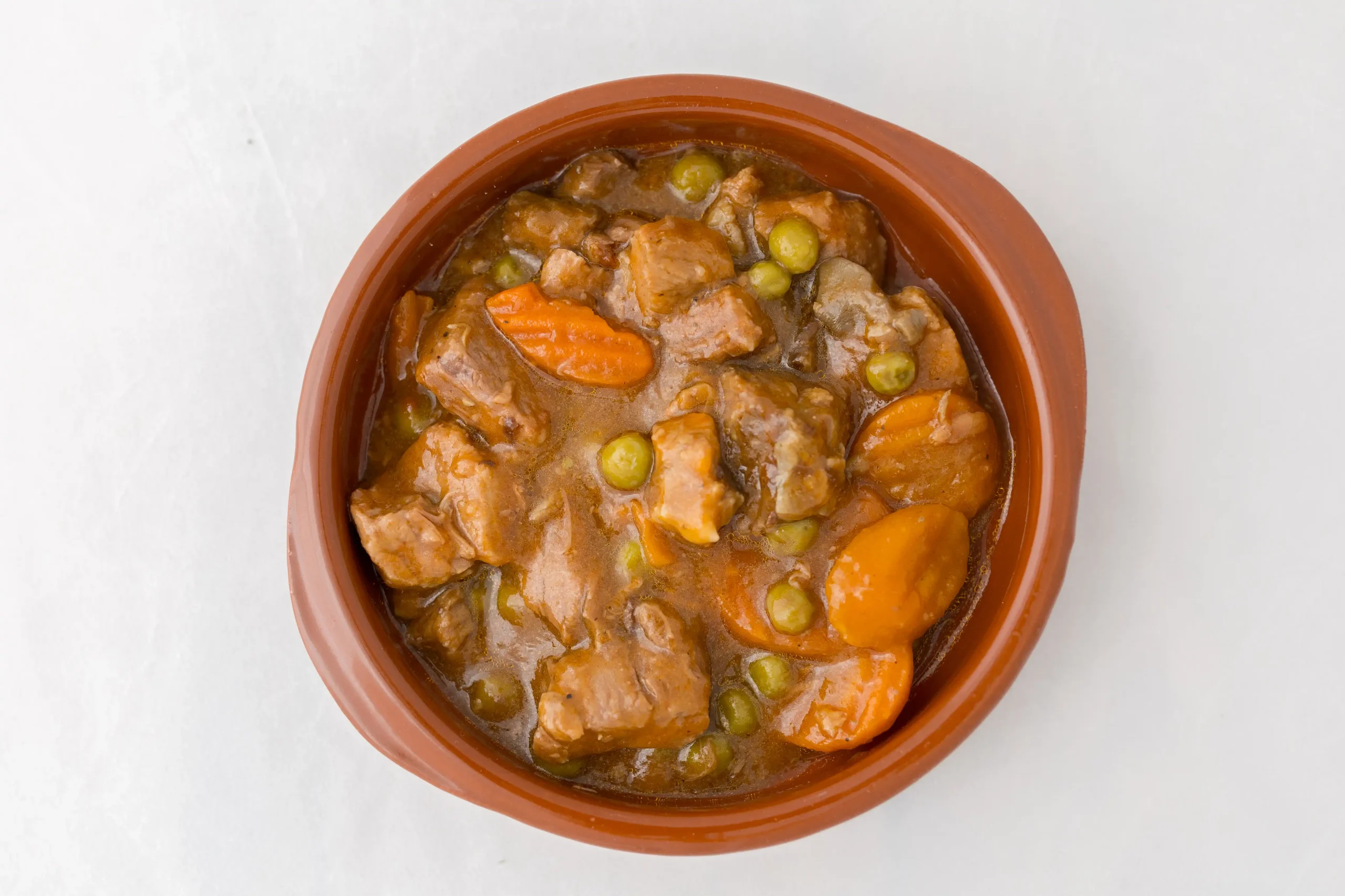 Ternera en salsa con guisantes
