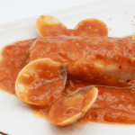Lomo de Merluza en salsa marinera con almejas